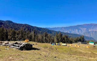 Lightweight camping tents set up in a beautiful landscape