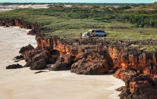Various camping tents set up in the Australian bush