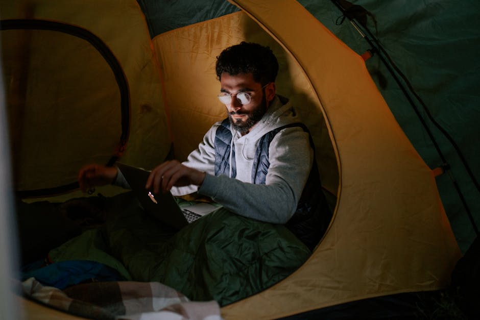 A high-tech camping tent featuring solar panels and LED lights